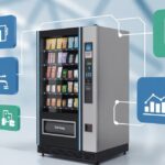 Smart vending machine filled with snacks, surrounded by digital icons representing data analytics, inventory automation, remote monitoring, and operational efficiency. Illustrates how connected vending technology improves performance and management.